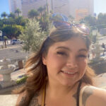 selfie photo of Lauren Terrell in a sunny city